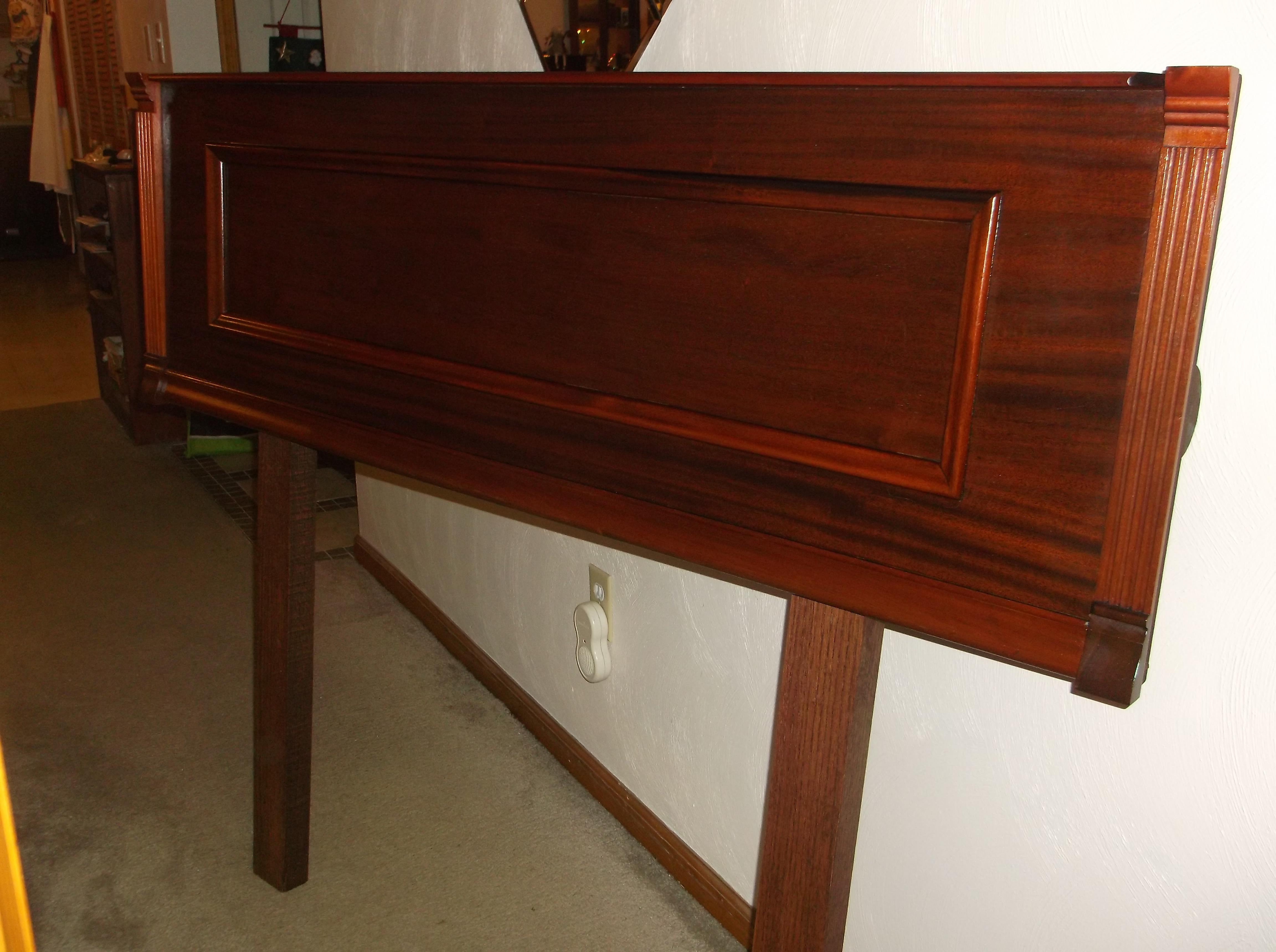 headboard made from an old piano