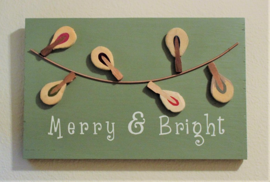 Christmas sign made from piano parts